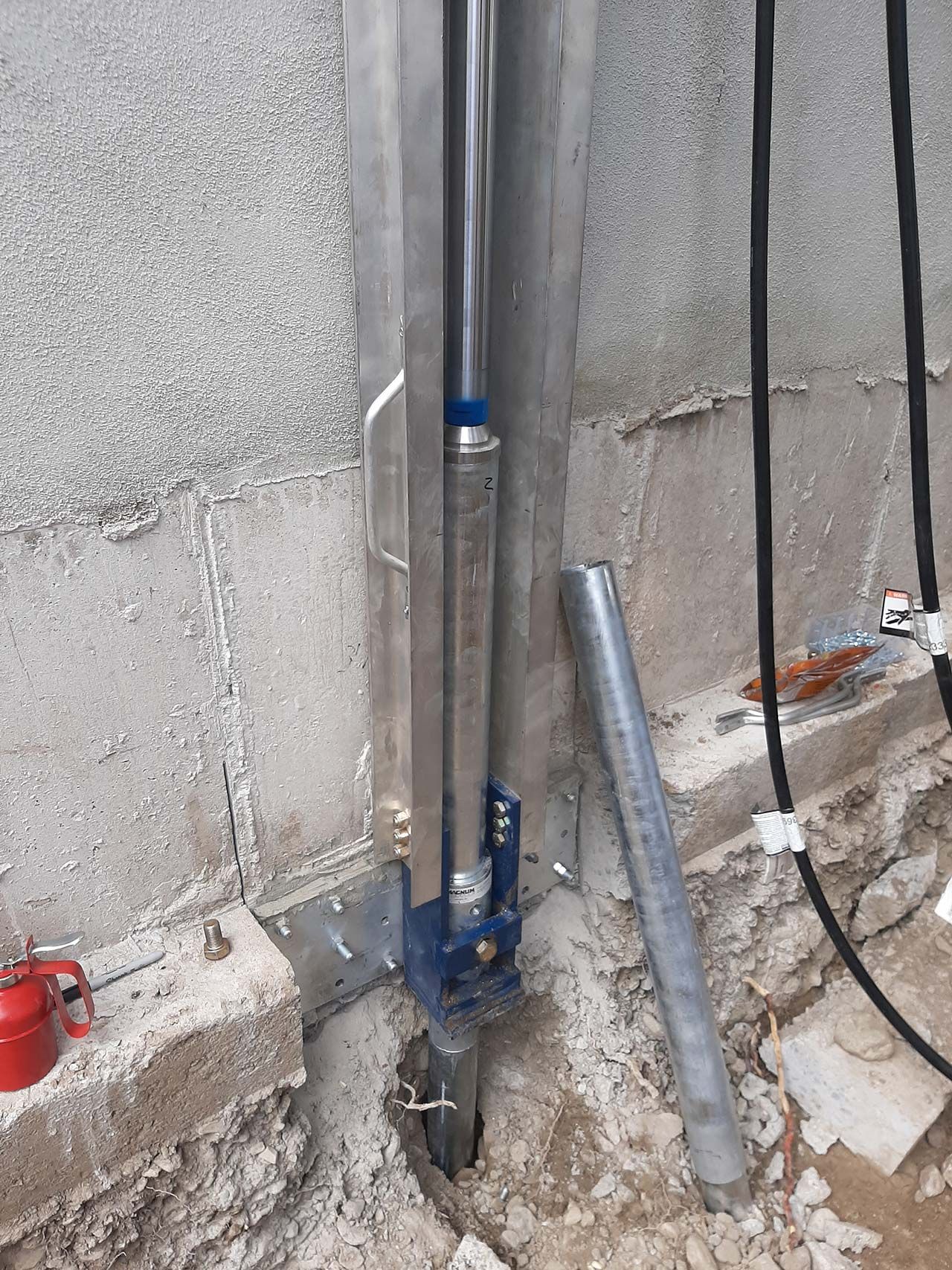 Garage floor raised back to level by Poly-Lift
