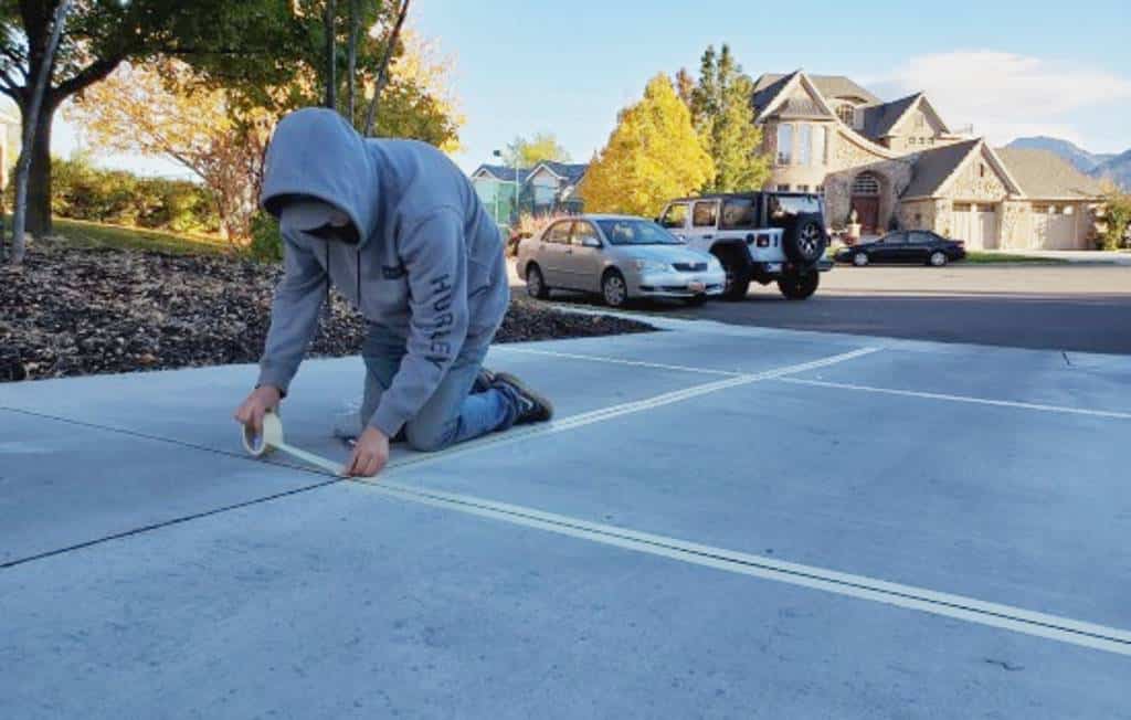 Concrete Sealing Prep Taping Driveway